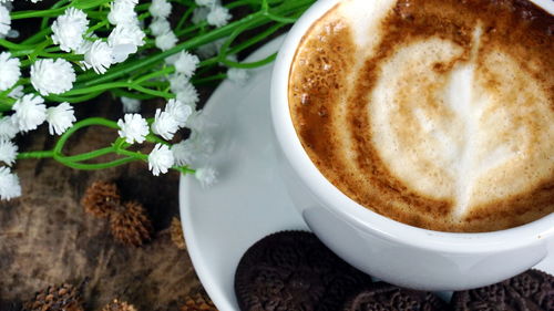 Close-up of cappuccino on table