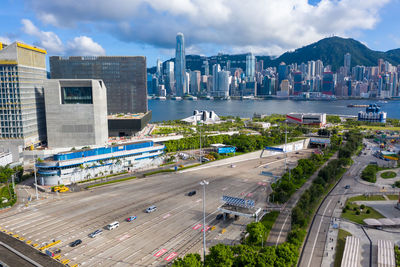 High angle view of street and buildings against sky