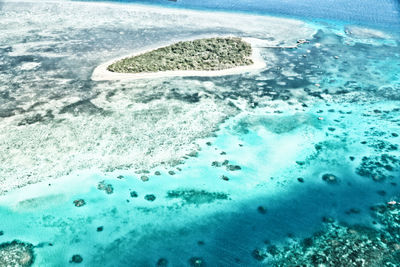 High angle view of surf on beach