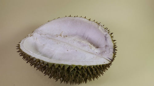 Close-up of banana over white background