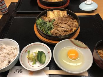 High angle view of meal served on table