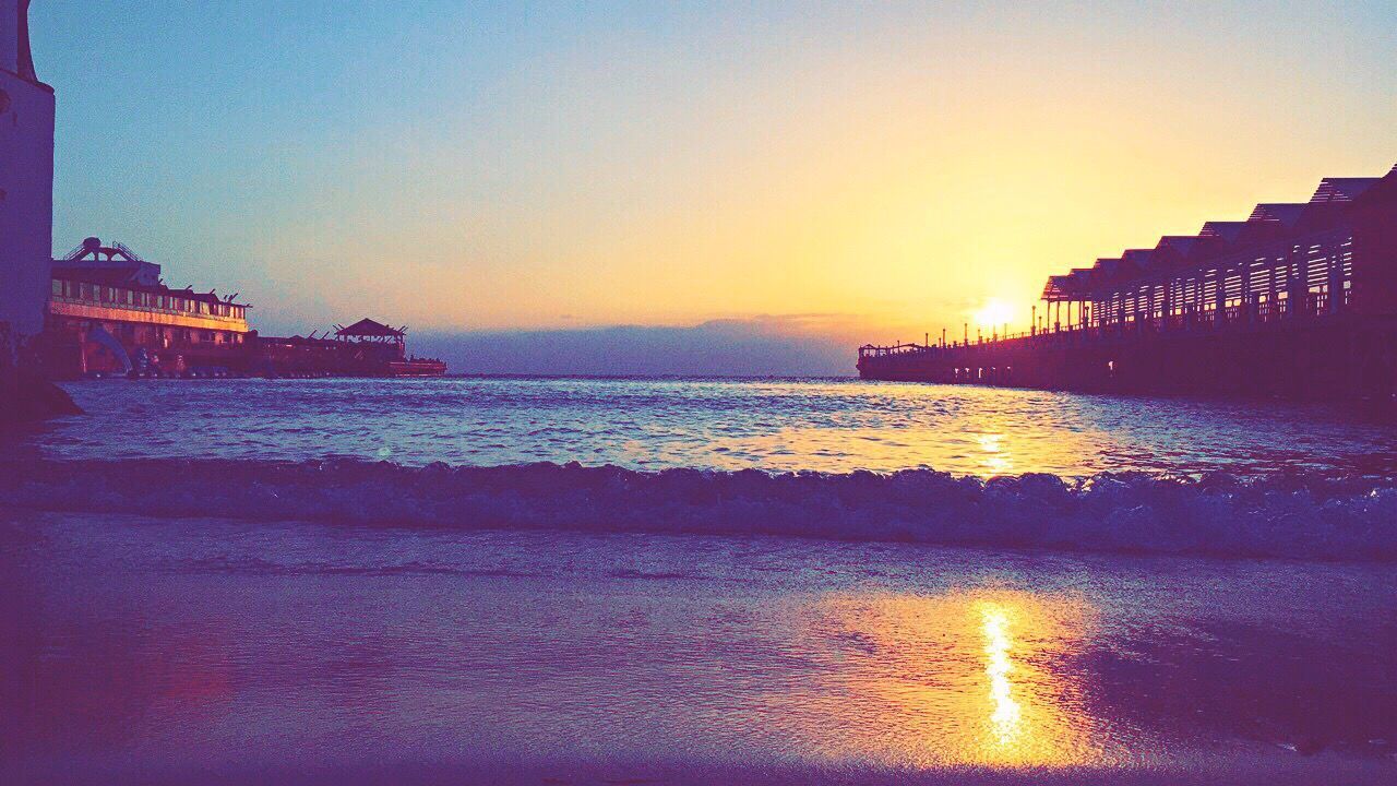 VIEW OF BEACH AT SUNSET