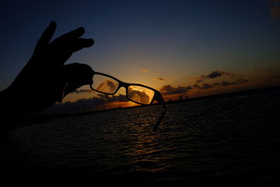 Scenic view of sea at sunset