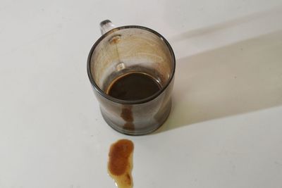 High angle view of coffee cup on table