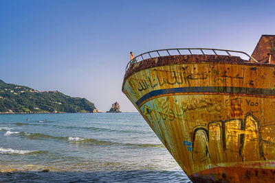 Scenic view of sea against clear blue sky