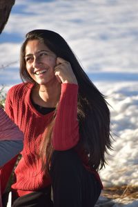 Portrait of a smiling young woman