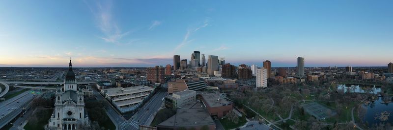 High angle view of city buildings against sky