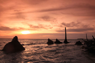 Scenic view of sea against sky during sunset