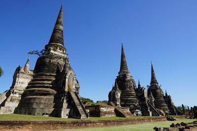 Old temples against clear sky