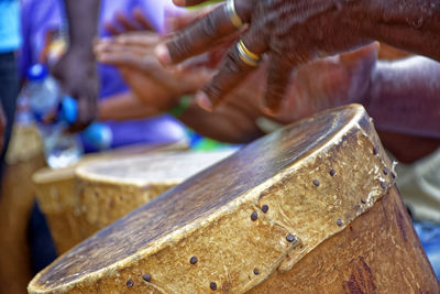 Close-up of people playing piano