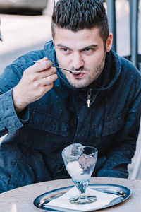 Portrait of man with ice cream