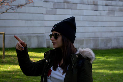 Young woman wearing sunglasses