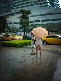 Woman standing in city