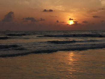 Scenic view of sea against sky during sunset