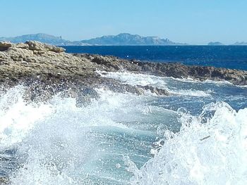 Scenic view of sea against clear sky