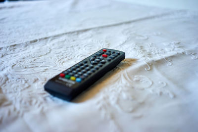 High angle view of telephone on table