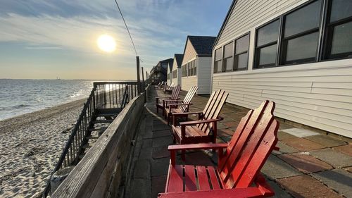 Summer vacation cottages on cape cod with adirondack chairs