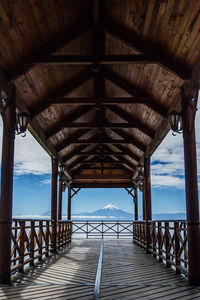 Pier over sea against sky