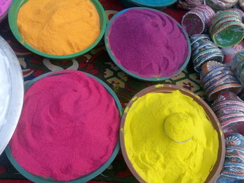 High angle view of colorful powder paint at market stall during diwali