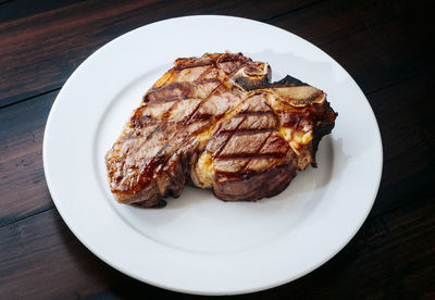 Close-up of meat in plate on table