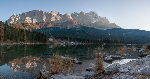 Scenic view of river against zugspitze