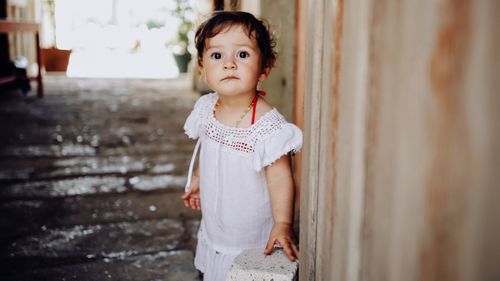 Portrait of cute girl looking away