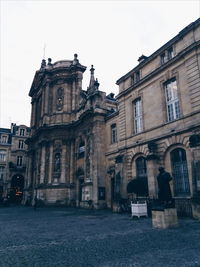 Facade of cathedral against sky