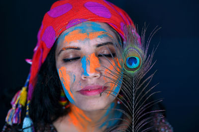 A young girl celebrating the festival of colours, holi.