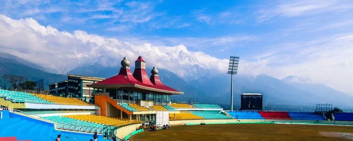 Panoramic view of traditional building against cloudy sky