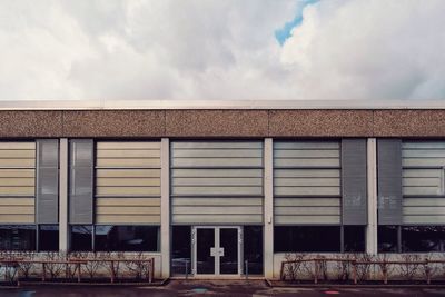 Exterior of building against cloudy sky