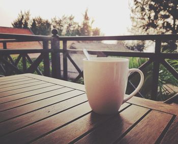 Close-up of coffee cup on table