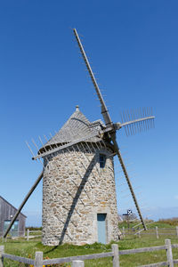 Trouguer windmill in cleden cap sizun during a sunny day