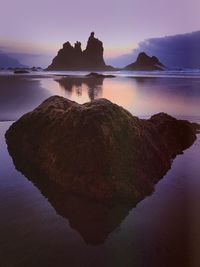 Scenic view of sea against sky at sunset