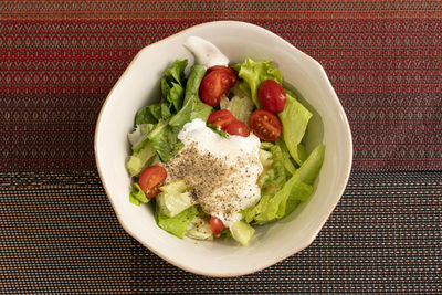 High angle view of salad in plate on table