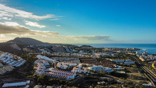 High angle view of city by sea