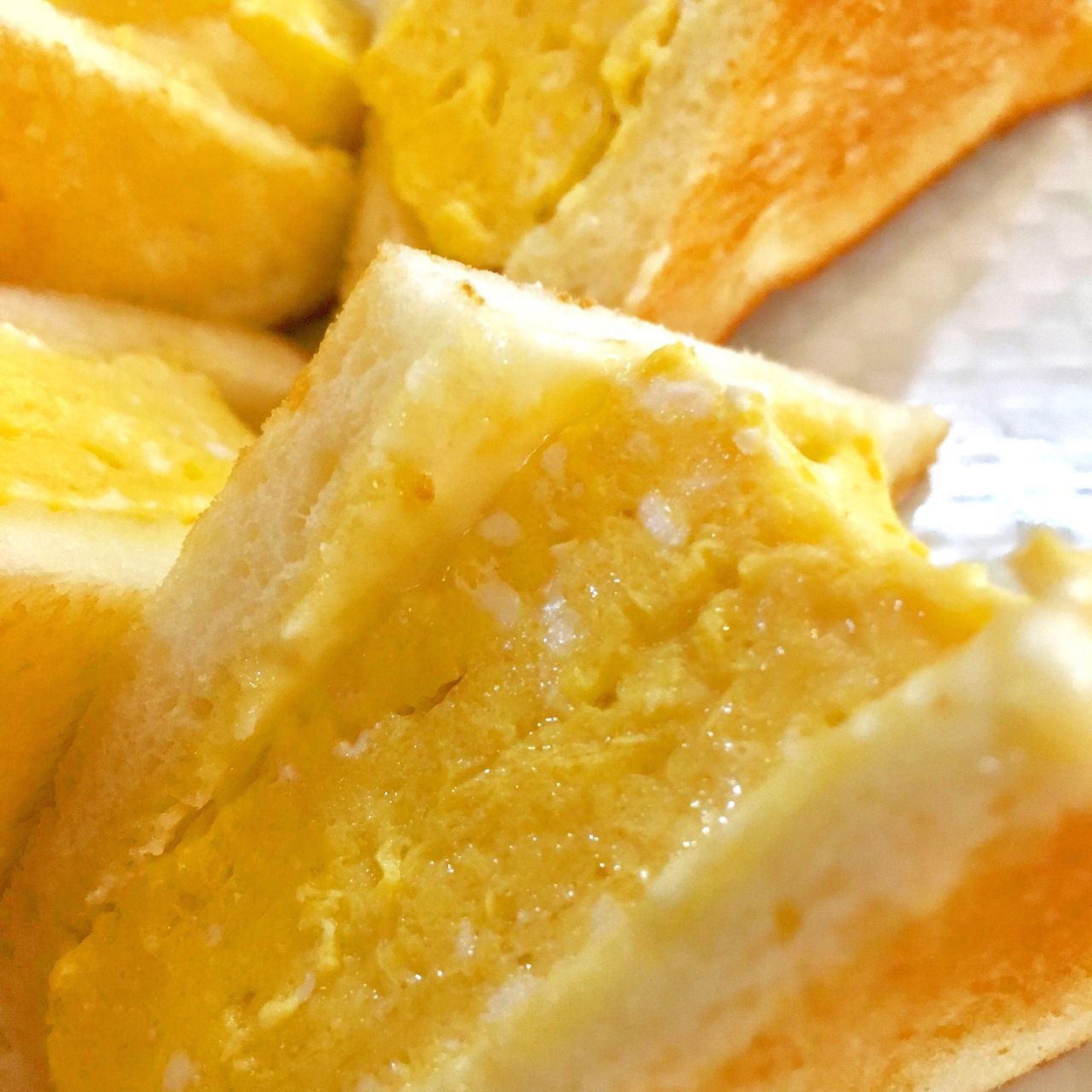 FULL FRAME SHOT OF YELLOW BREAD