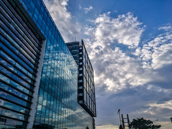 Low angle view of modern building against sky