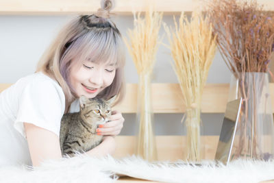 Full length of cute girl wearing hat