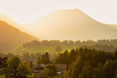 Scenic view of mountains against sky during sunset