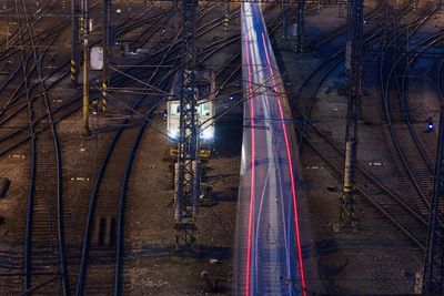 High angle view of illuminated bridge in city at night