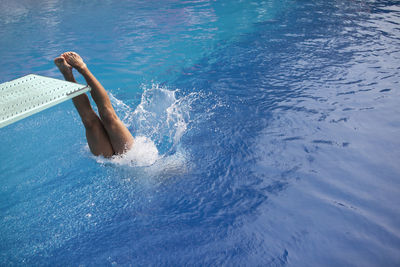 Woman swimming in pool