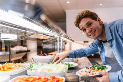 Portrait of a man with food