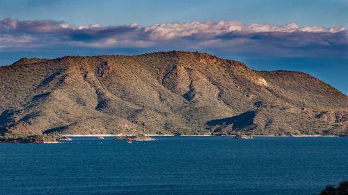 Scenic view of bay against sky