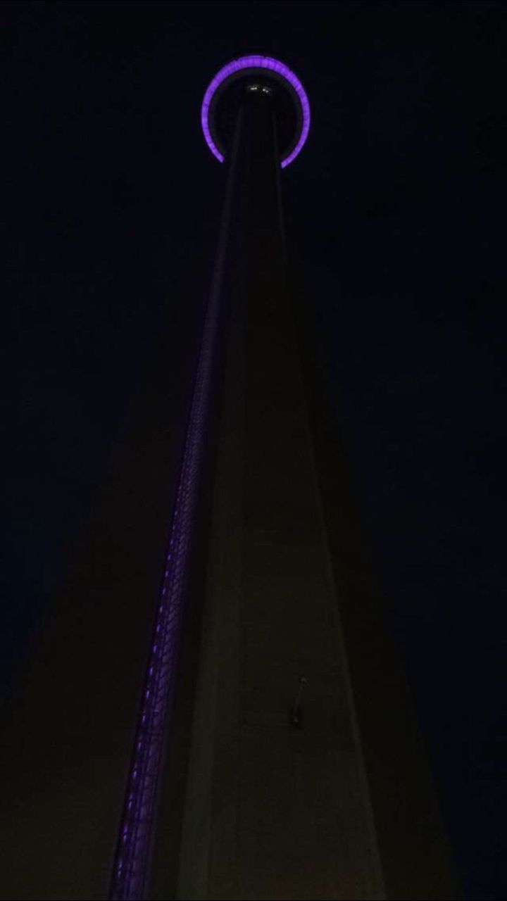 night, illuminated, low angle view, copy space, blue, clear sky, lighting equipment, built structure, light - natural phenomenon, architecture, tall - high, street light, no people, long exposure, outdoors, glowing, dark, light trail, tower, sky