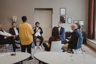 Business people discussing during training session in corporate office