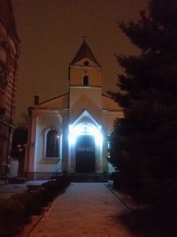 Illuminated cathedral against sky at night