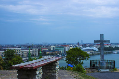 High angle view of buildings and trees against sky
