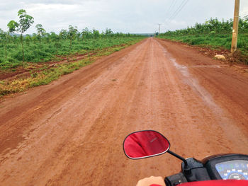 Man on road against sky