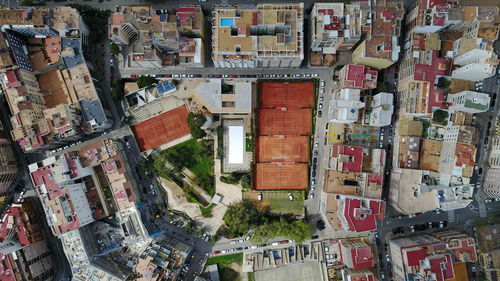 Aerial view of street amidst buildings in town