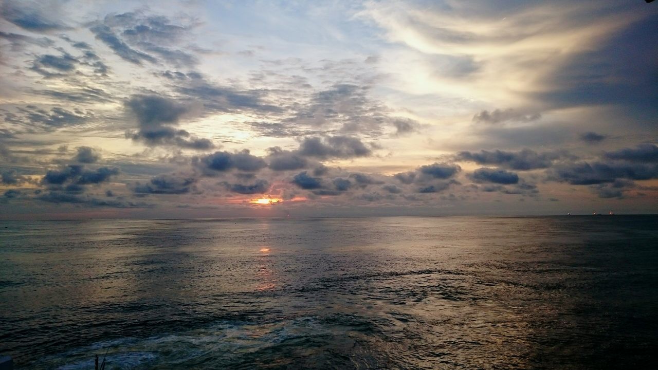 sea, horizon over water, water, tranquil scene, scenics, tranquility, beauty in nature, sky, sunset, beach, nature, idyllic, cloud - sky, shore, seascape, reflection, cloud, outdoors, sun, remote